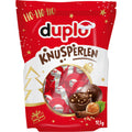 Duplo Knusperperlen 97,5 g Beutel, gefüllte Milchschokoladenkugeln mit Haselnuss-Kakaocreme und Reiscrispies.