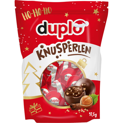 Duplo Knusperperlen 97,5 g Beutel, gefüllte Milchschokoladenkugeln mit Haselnuss-Kakaocreme und Reiscrispies.